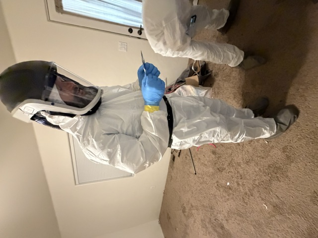 XeroTrace Decon technicians documenting a biohazard scene for insurance